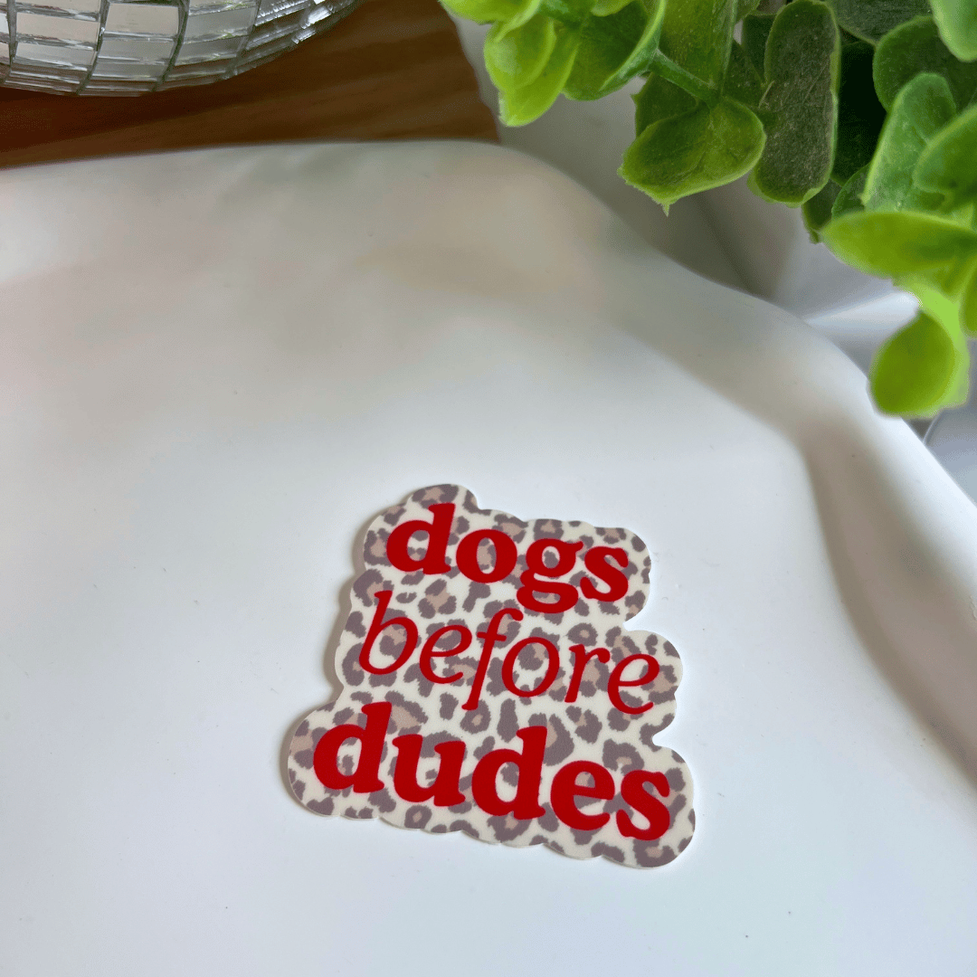 Sticker "dogs before dudes"